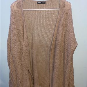 Beige thigh length sweater